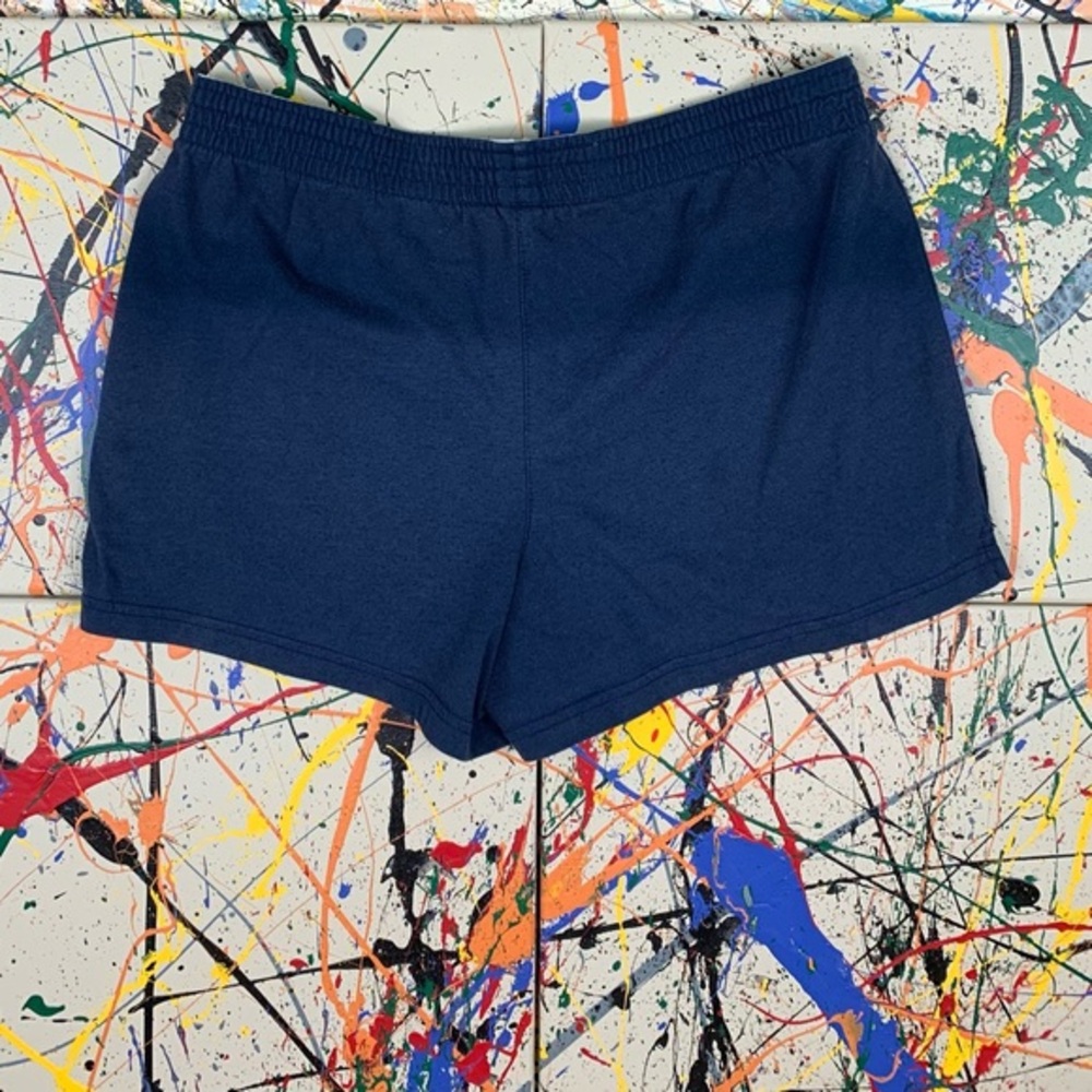 Champion Gear navy blue athletic shorts.